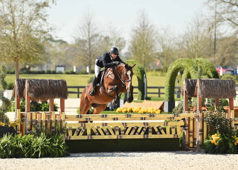 Ella jumping a hunter fence. Photograph © Andrew Ryback 2022.